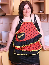 Teenage plumper demonstrates her curves in kitchen_30